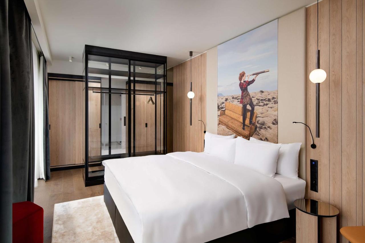 Radisson Blu Hotel, Cluj المظهر الخارجي الصورة A bedroom at the hotel