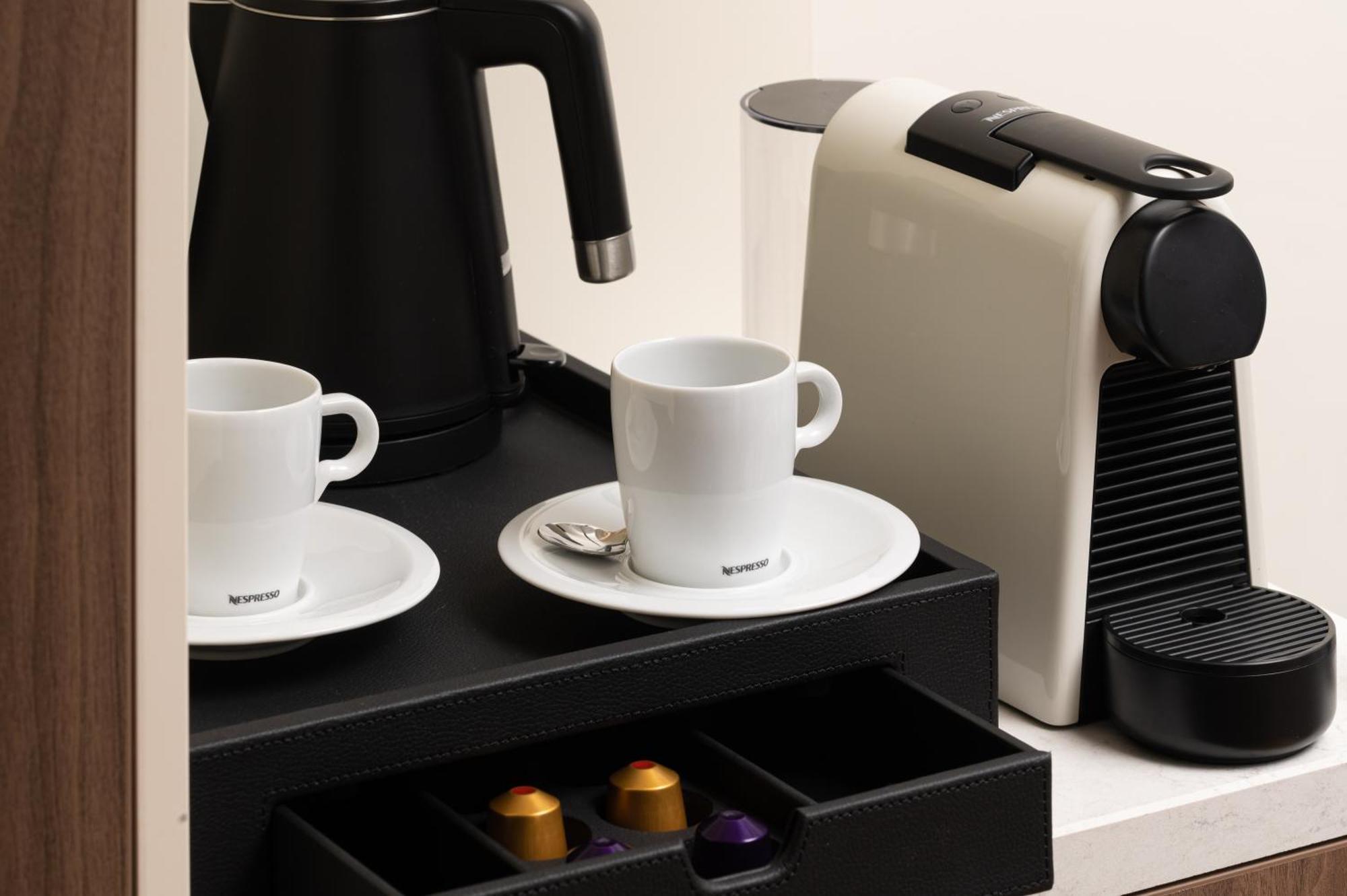 Radisson Blu Hotel, Cluj المظهر الخارجي الصورة A Nespresso coffee machine